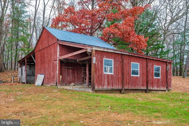 a picture of a bench in front of a window