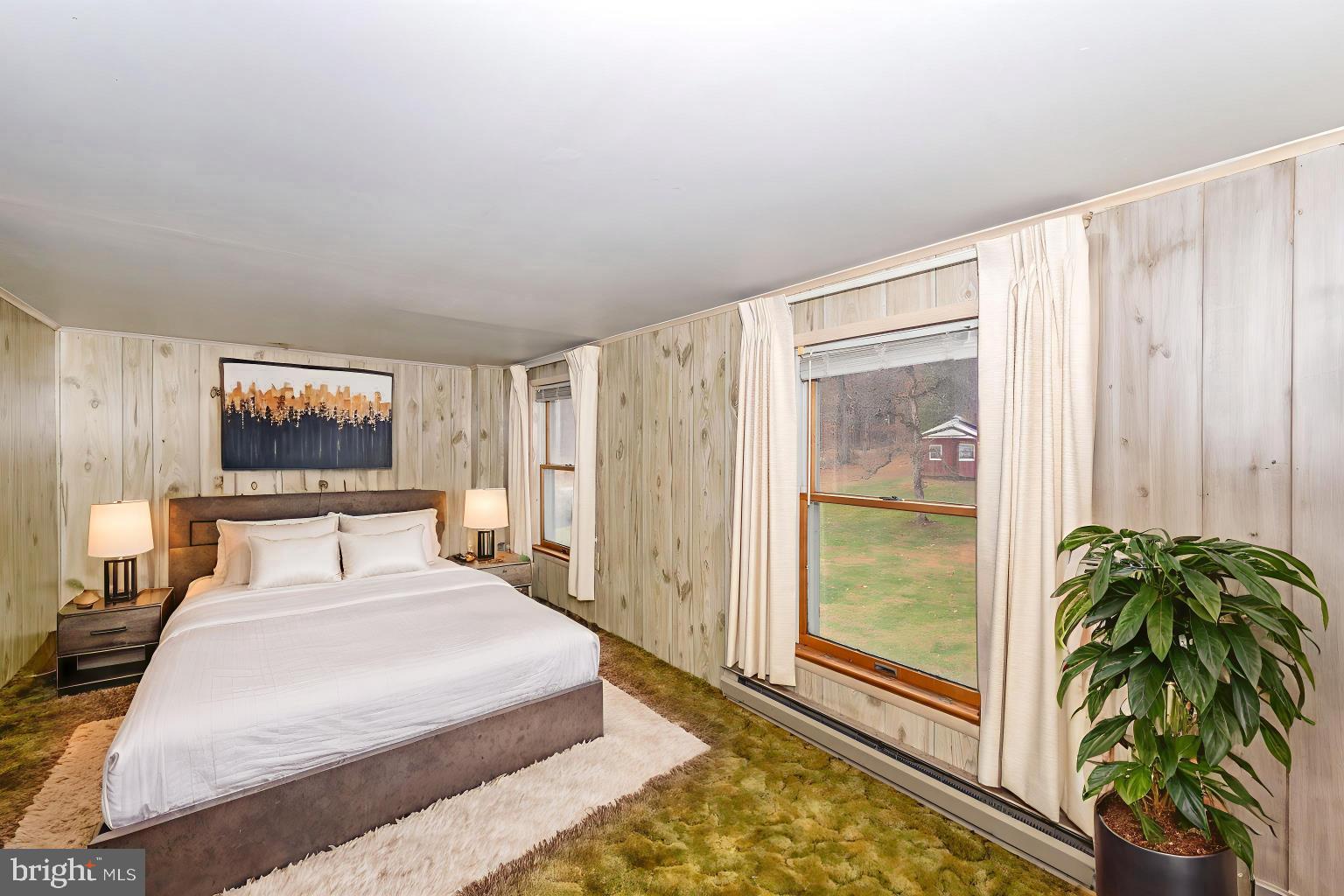 10622 National Pike Big Pool, MD 21711 - Photo 55 of 60 a bedroom with a bed and a large window