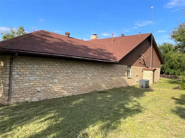 a view of a house with a swimming pool