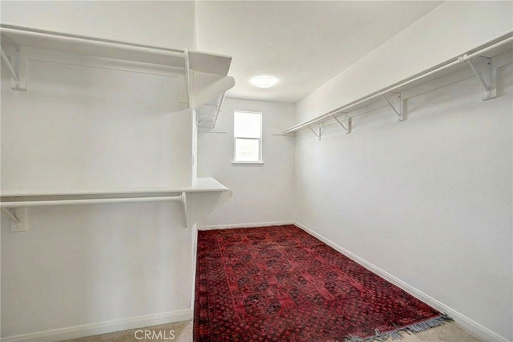 17073 Grove Drive Riverside, CA 92503 - Photo 37 of 69 Digitally altered. Removed clothing from the primary closet.