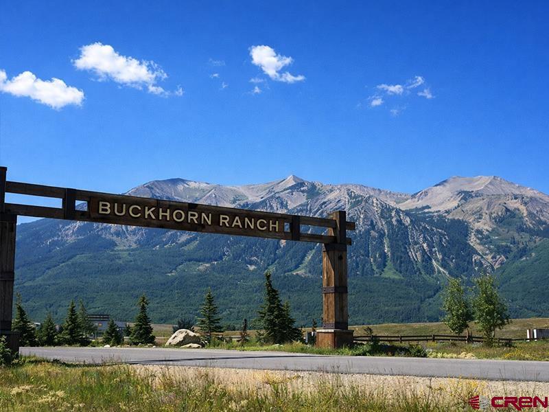 88 Bridle Spur Way Crested Butte, CO 81224 - Photo 11 of 13 a view of a house with a yard and a fountain