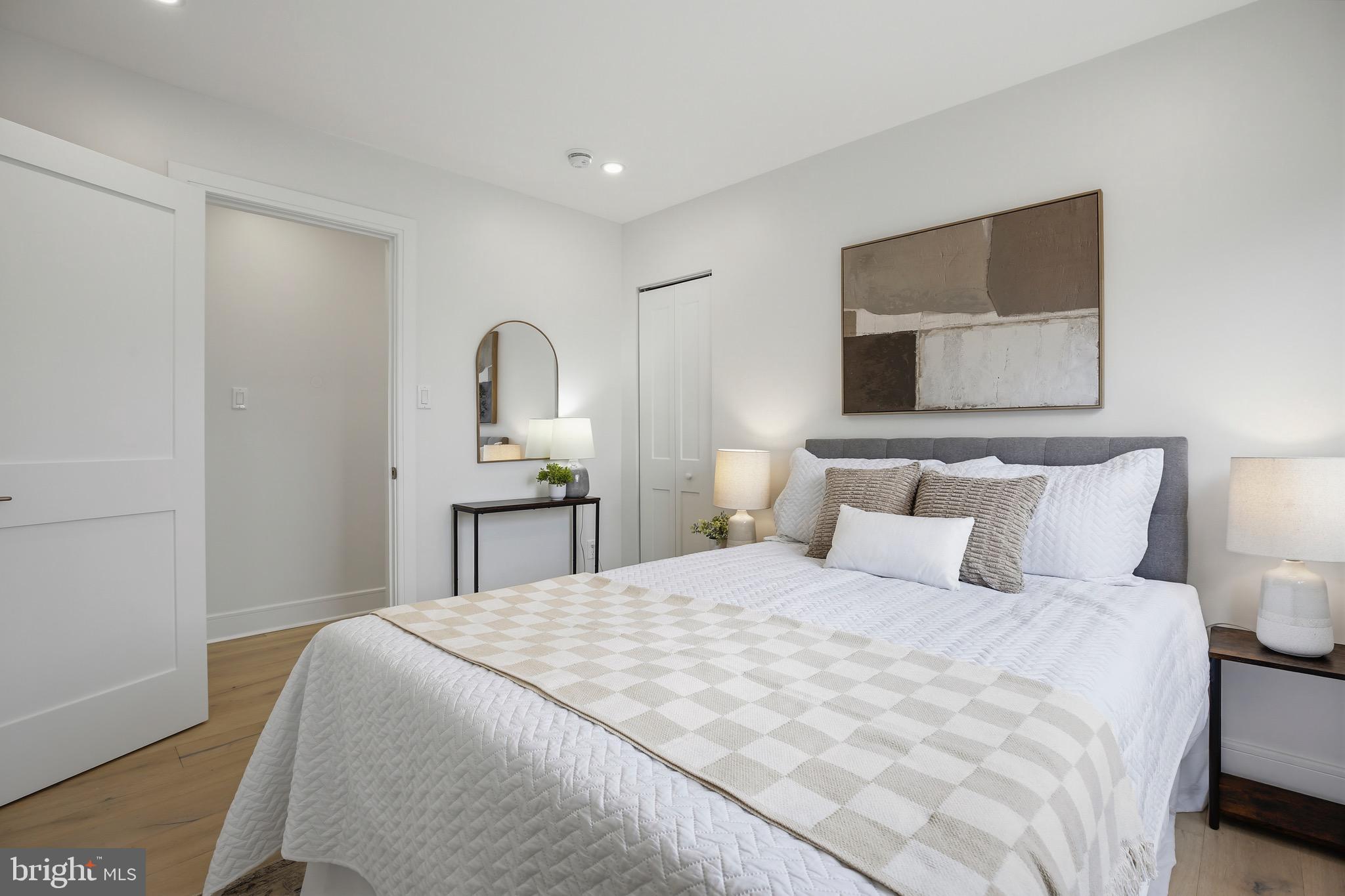 14828 Fireside Drive Silver Spring, MD 20905 - Photo 22 of 54 a bedroom with a bed and a tv