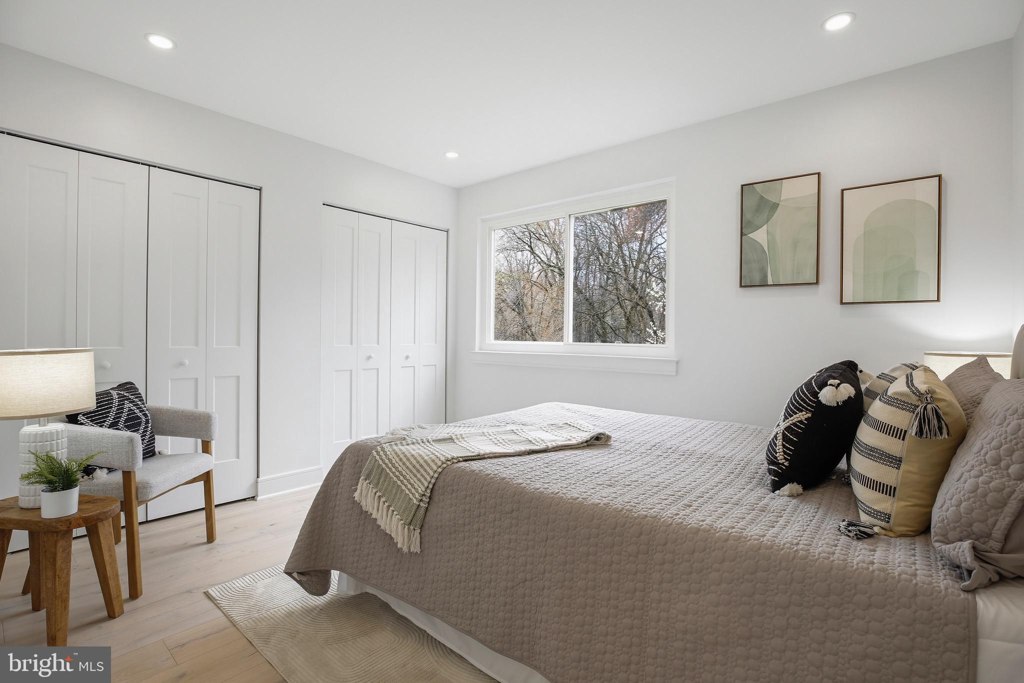 14828 Fireside Drive Silver Spring, MD 20905 - Photo 25 of 54 a bedroom with a bed and window