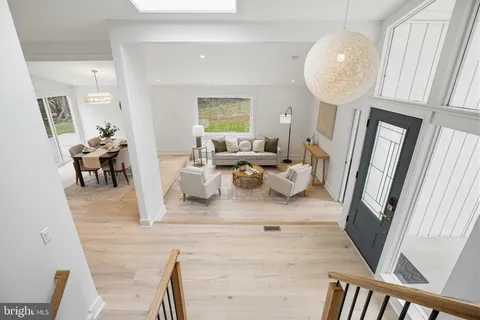 a view of living room and dining room
