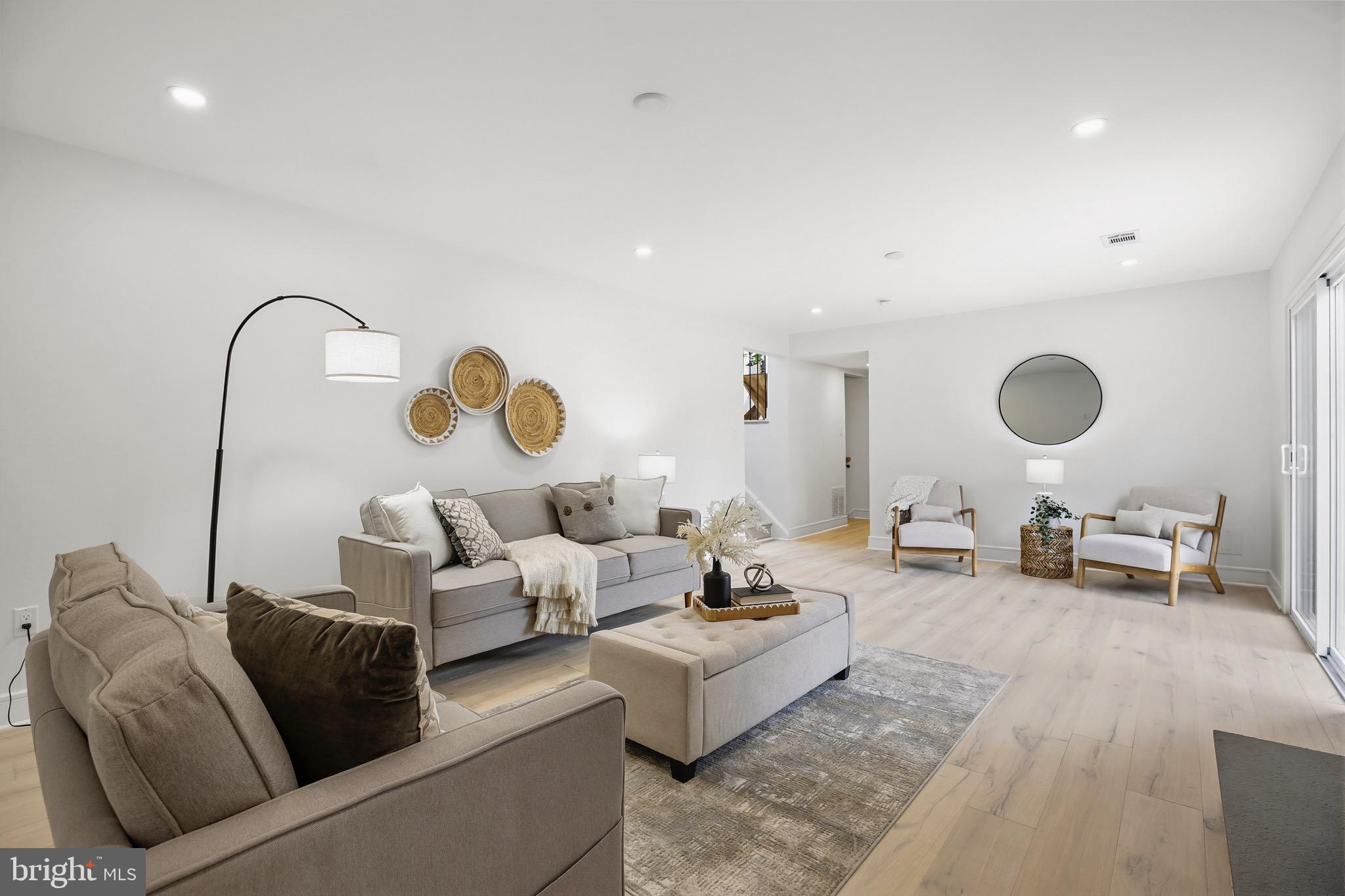 14828 Fireside Drive Silver Spring, MD 20905 - Photo 28 of 54 a living room with furniture and a rug