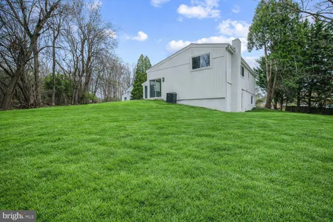 a house view with garden space
