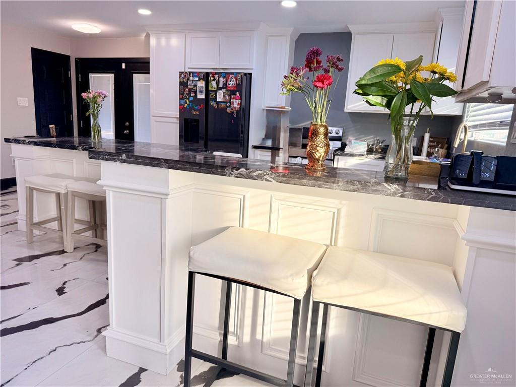 940 West Mile 3 Road Mission, TX 78573 - Photo 14 of 25 a view of living room with furniture and flat screen tv