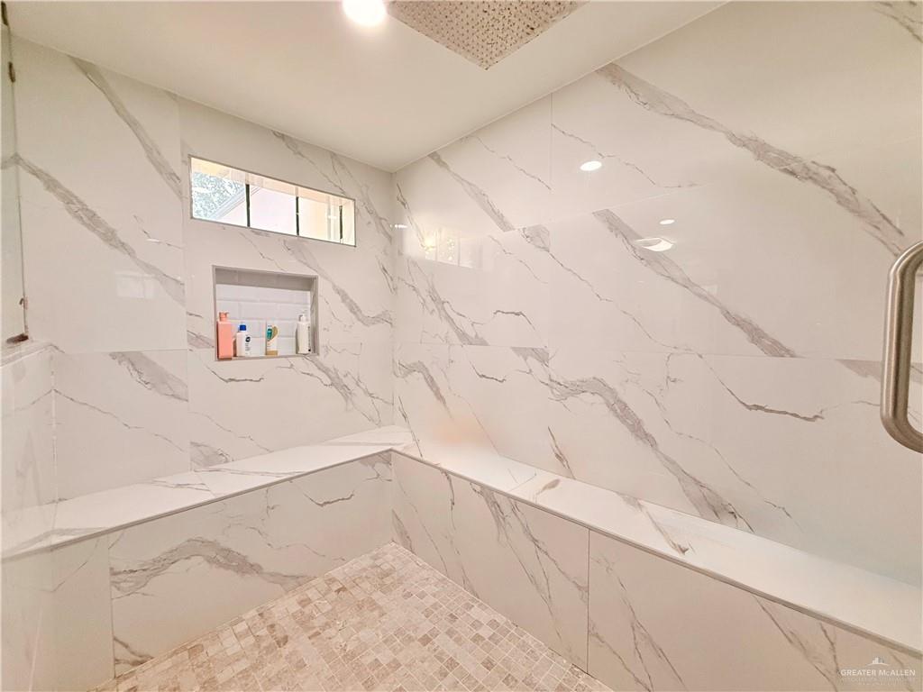 940 West Mile 3 Road Mission, TX 78573 - Photo 20 of 25 a view of a bathtub in a bathroom