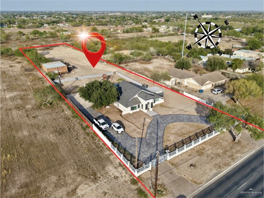940 West Mile 3 Road Mission, TX 78573 - Photo 2 of 25 an aerial view of a house with outdoor space