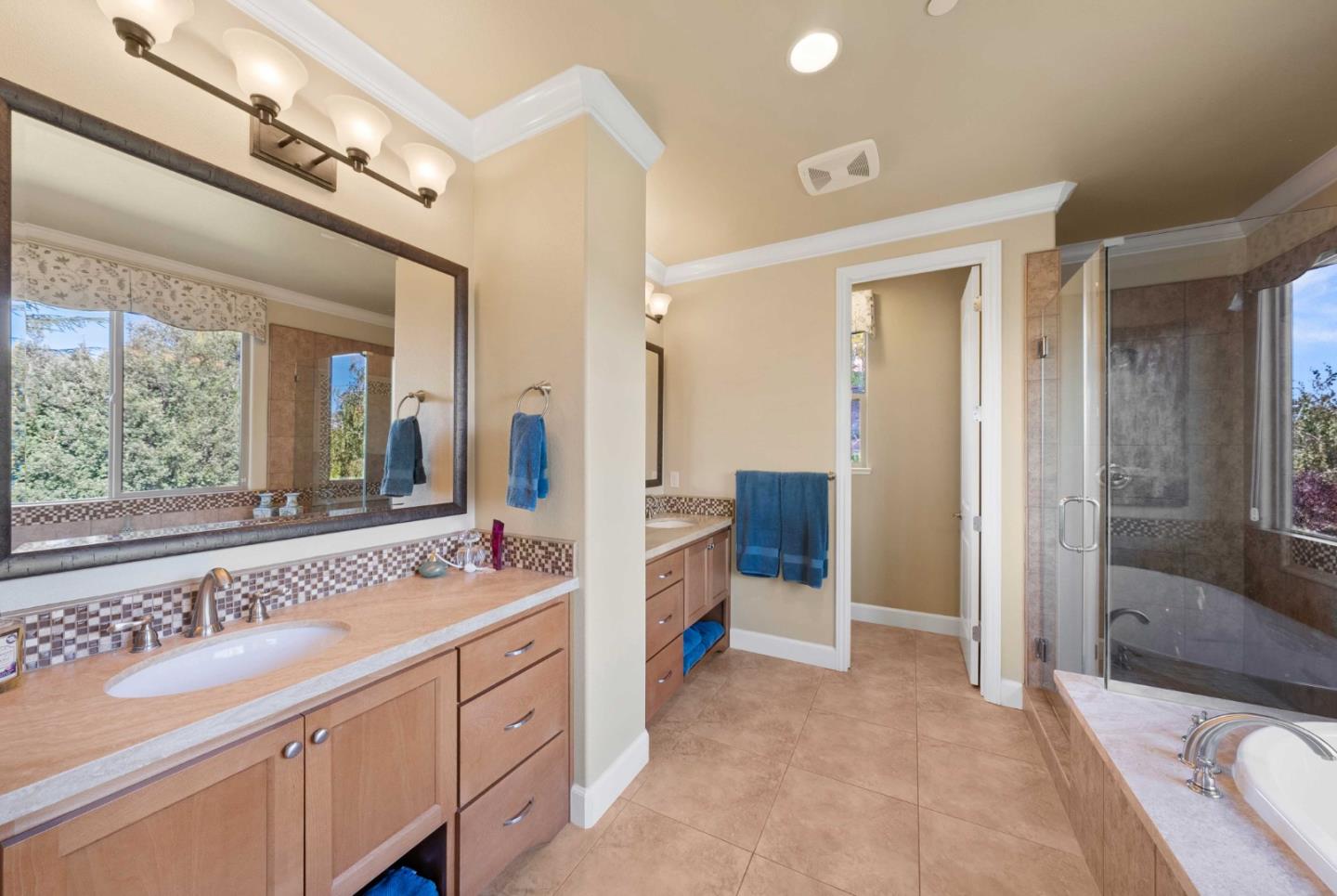 1477 Corte De Maria San Jose, CA 95120 - Photo 13 of 29 a spacious bathroom with a sink mirror and a shower