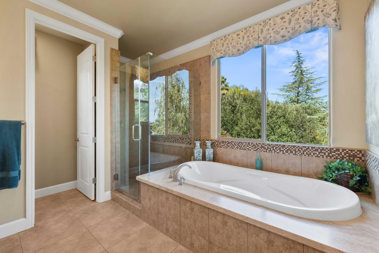 1477 Corte De Maria San Jose, CA 95120 - Photo 14 of 29 a bath tub sitting in a bathroom next to a window
