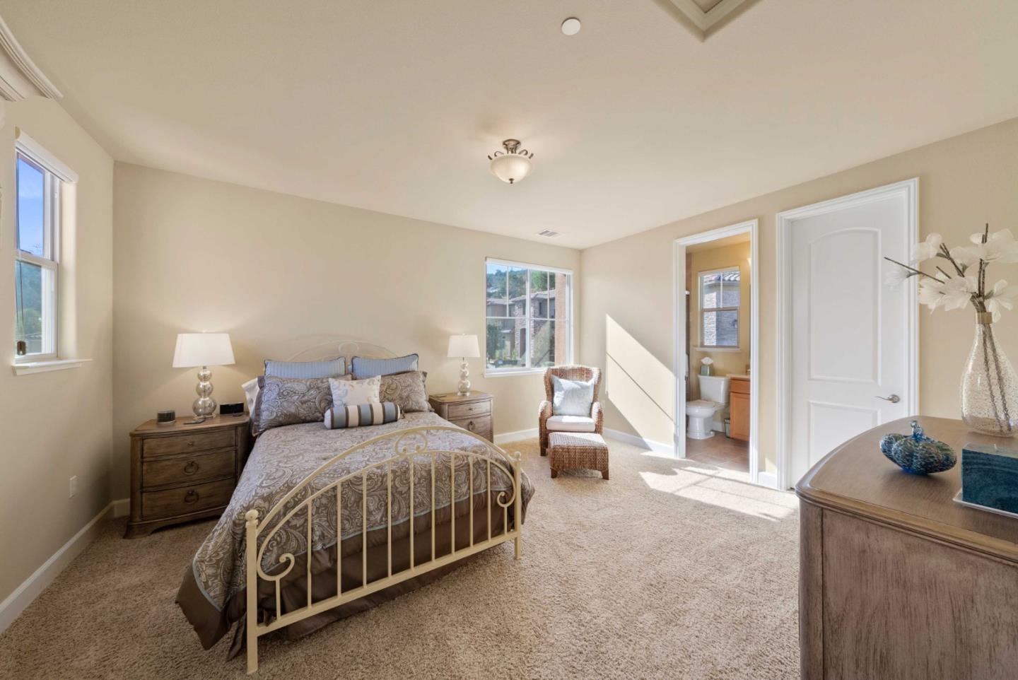 1477 Corte De Maria San Jose, CA 95120 - Photo 15 of 29 a bedroom with a bed and large windows