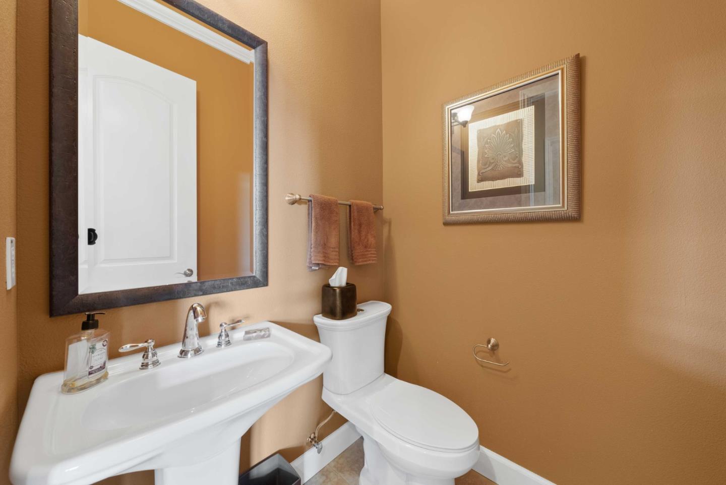 1477 Corte De Maria San Jose, CA 95120 - Photo 20 of 29 a bathroom with a toilet a sink and mirror