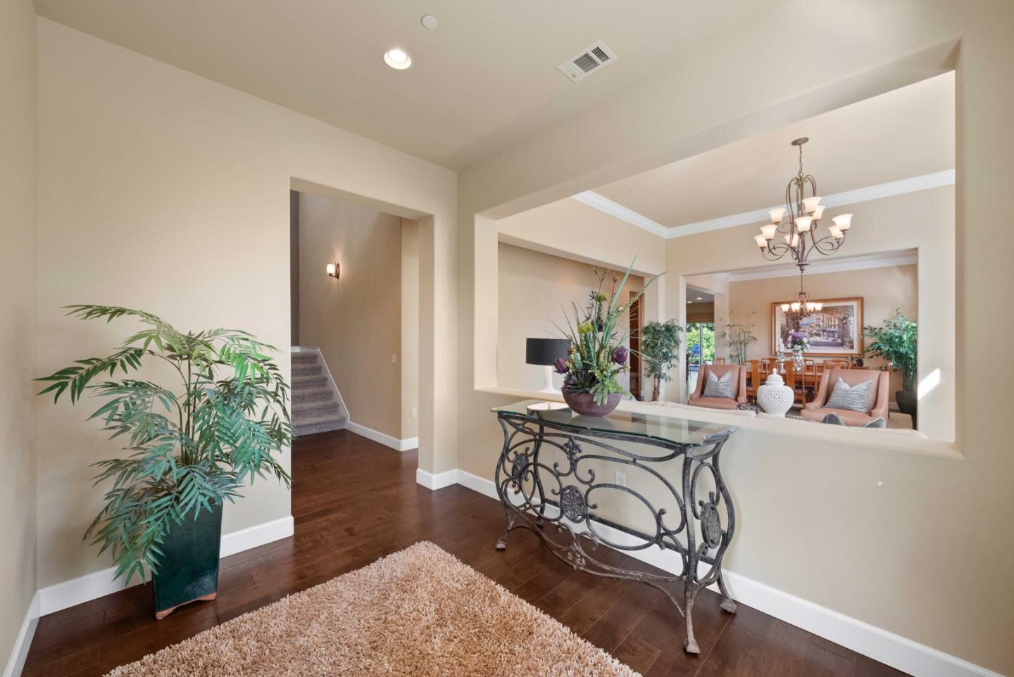 1477 Corte De Maria San Jose, CA 95120 - Photo 2 of 29 a view of a dining room with furniture and a chandelier