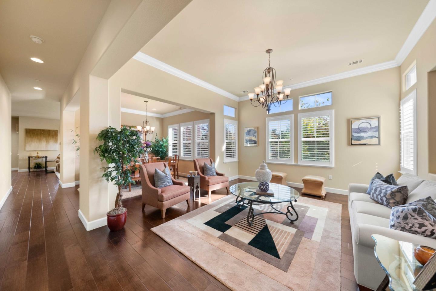1477 Corte De Maria San Jose, CA 95120 - Photo 3 of 29 a living room with furniture and a chandelier