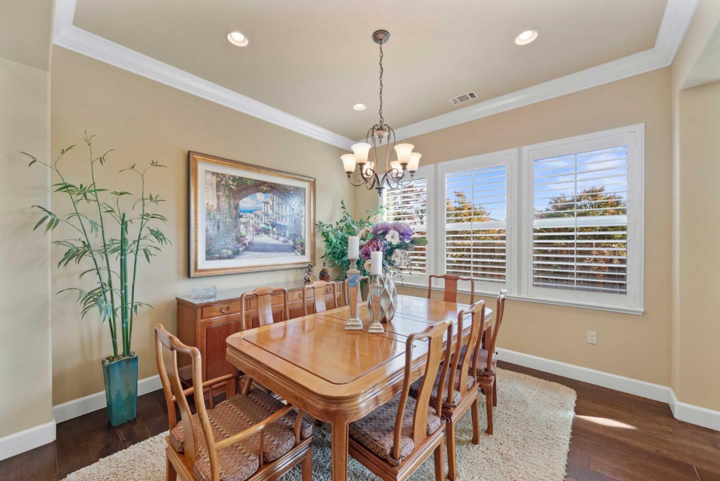 1477 Corte De Maria San Jose, CA 95120 - Photo 4 of 29 a dining room with furniture a rug and a chandelier