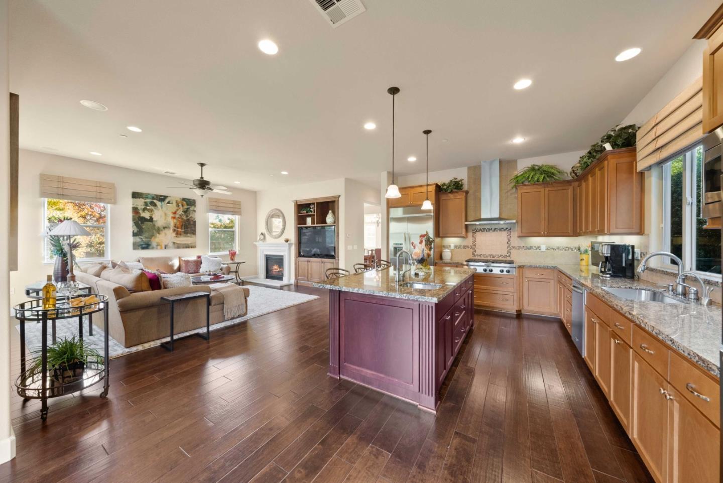 1477 Corte De Maria San Jose, CA 95120 - Photo 8 of 29 a large kitchen with lots of counter space a sink appliances and living room view