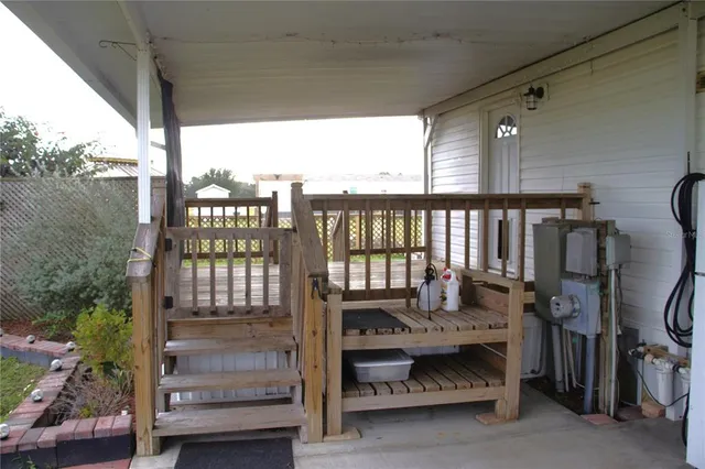a view of balcony with furniture
