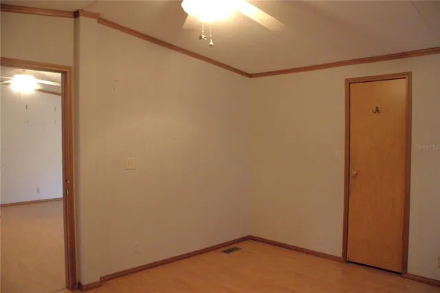 a view of a hallway with closet