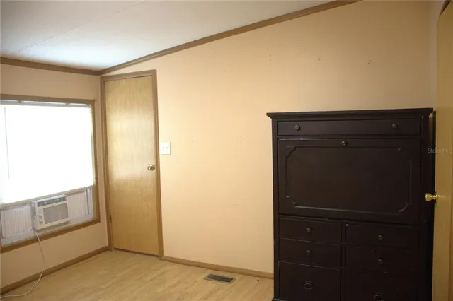 a view of a room with racks on the wall