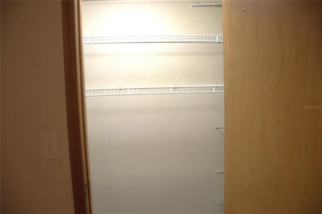 a view of a room with a window