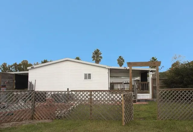 a front view of a house with glass door