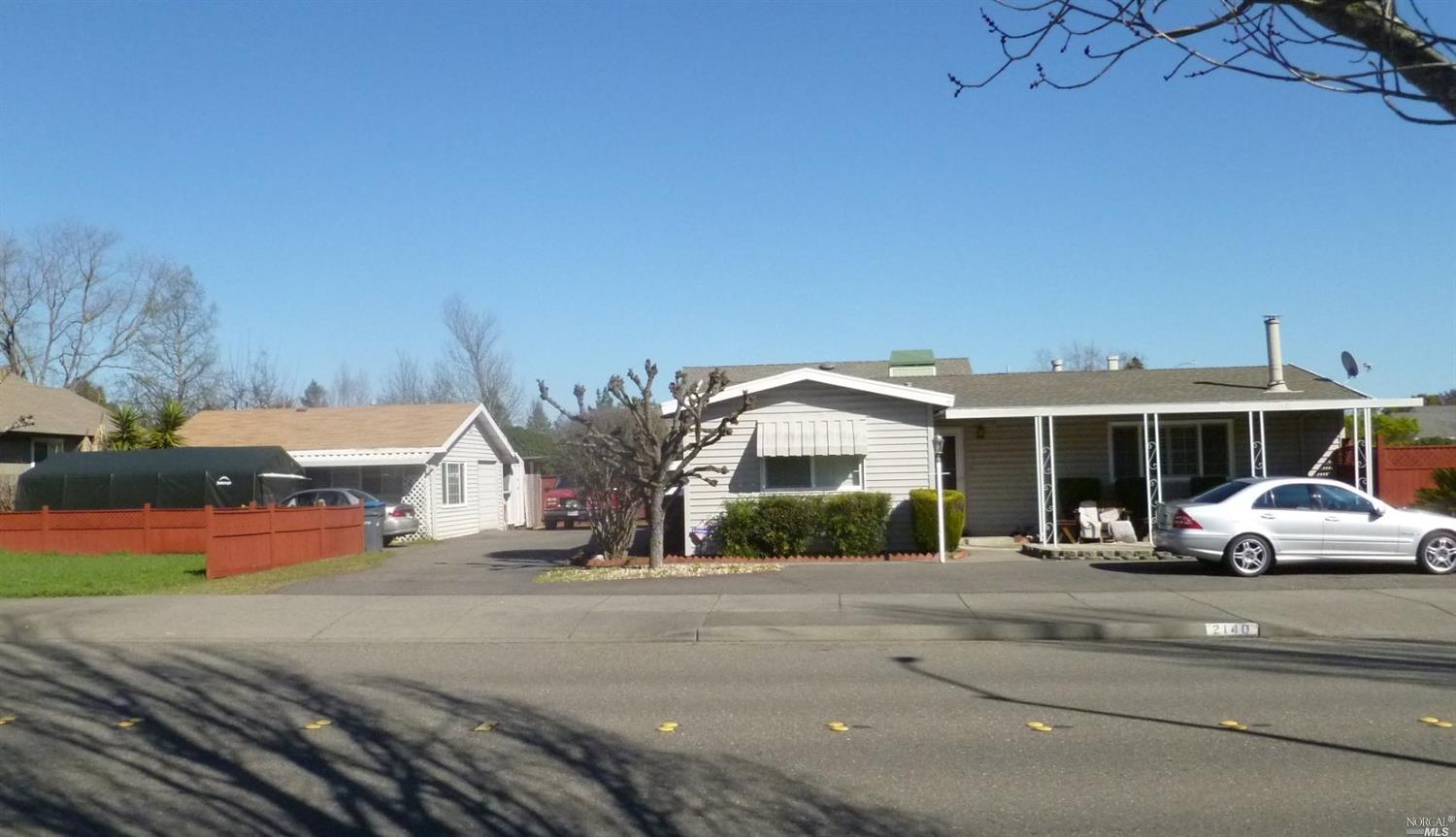 2140 Waltzer Road Santa Rosa, CA 95403 - Photo 1 of 1 a car parked on the side of the road