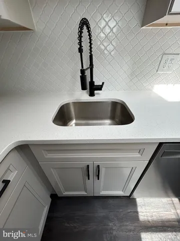 a kitchen with a stove and a microwave