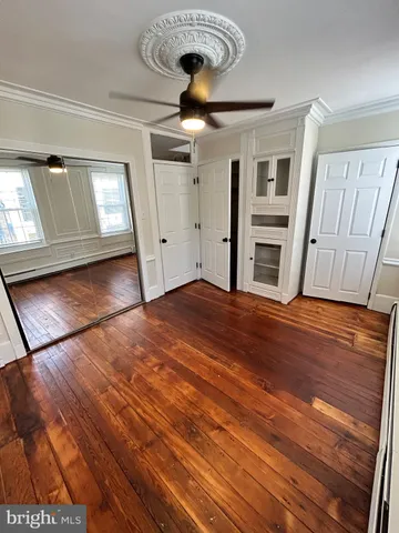 a front view of a house with a glass door