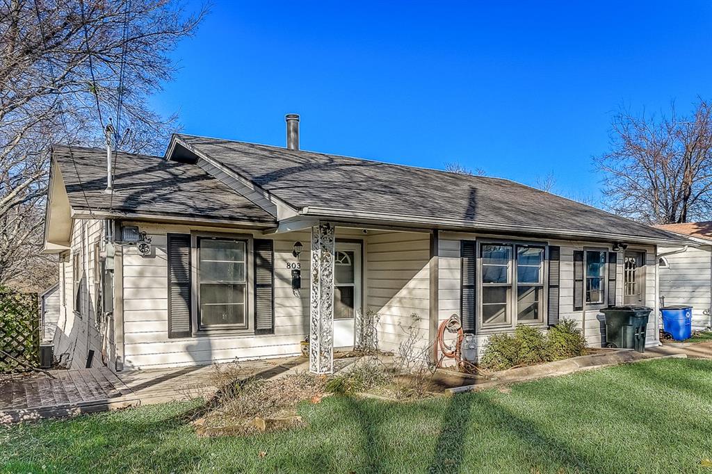 803 North Alamo Road Rockwall, TX 75087 - Photo 1 of 1 front view of a house with a yard