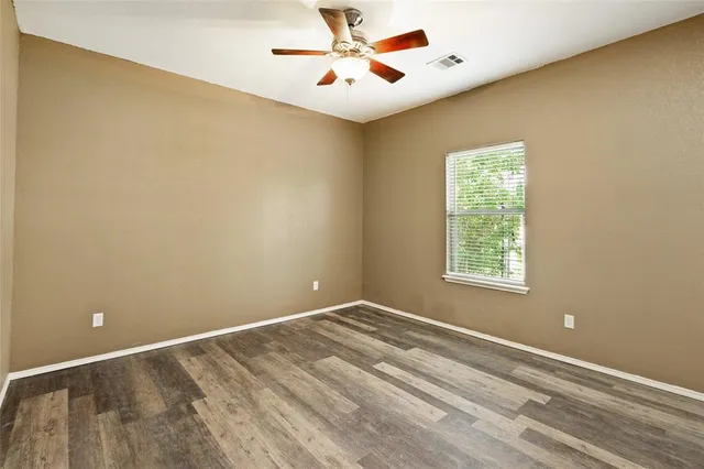a bathroom with a sink mirror toilet and bathtub