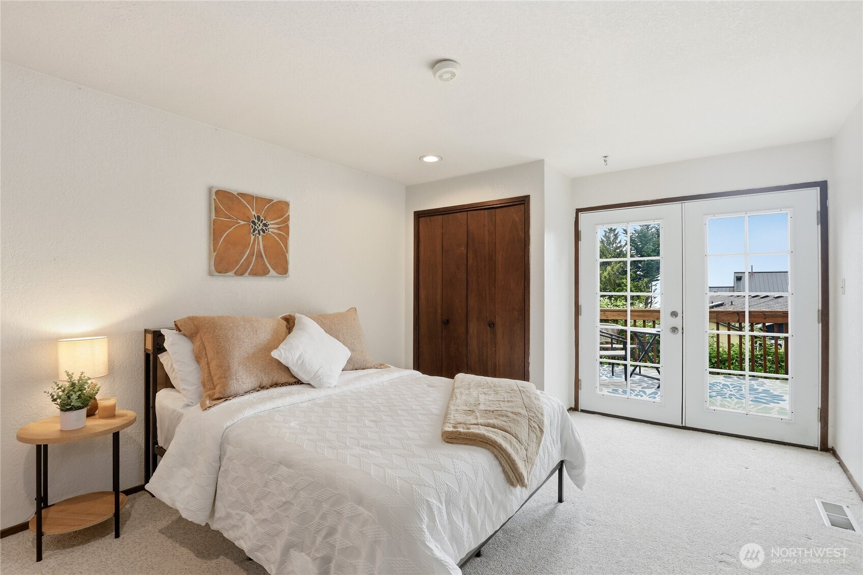 2417 Cedar Street East Port Orchard, WA 98366 - Photo 22 of 40 a bedroom with a large bed and a window