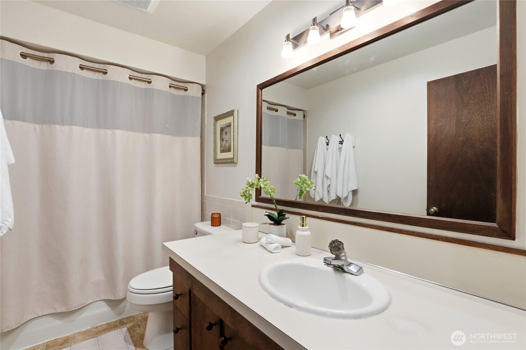 2417 Cedar Street East Port Orchard, WA 98366 - Photo 28 of 40 a bathroom with a sink toilet and shower