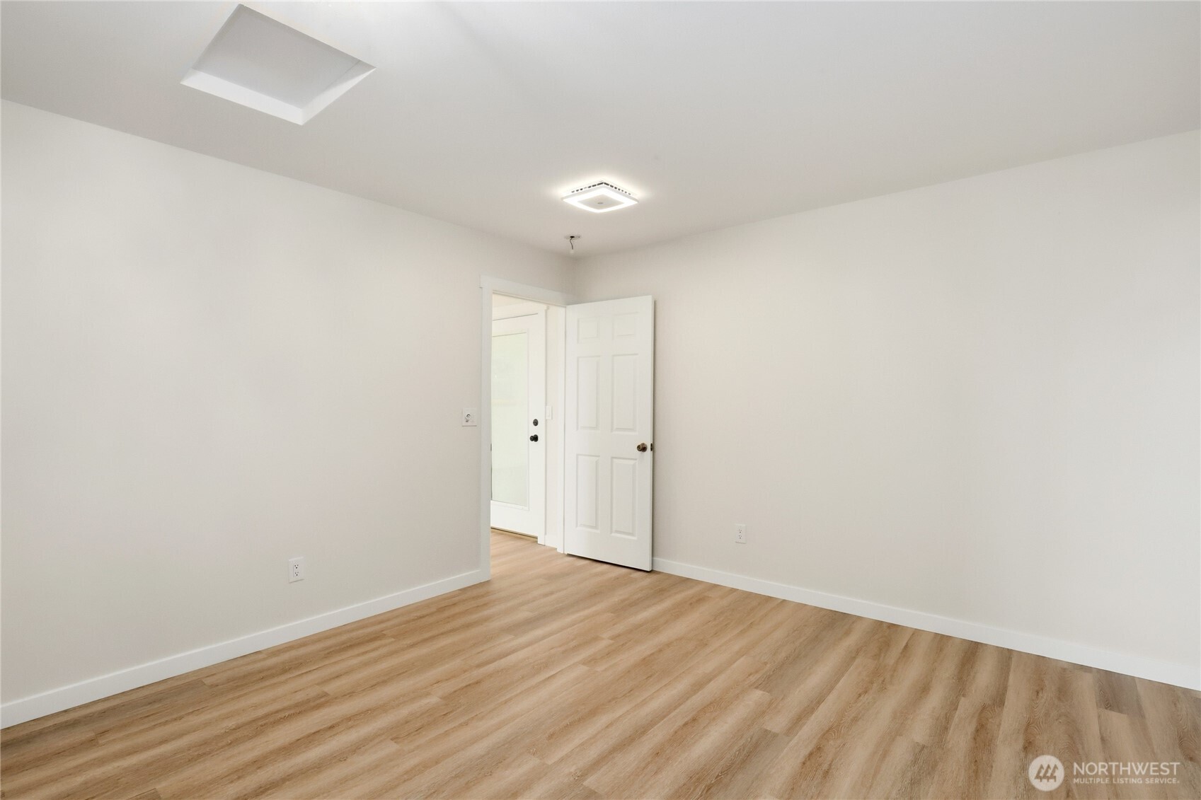 2417 Cedar Street East Port Orchard, WA 98366 - Photo 36 of 40 a view of empty room with wooden floor