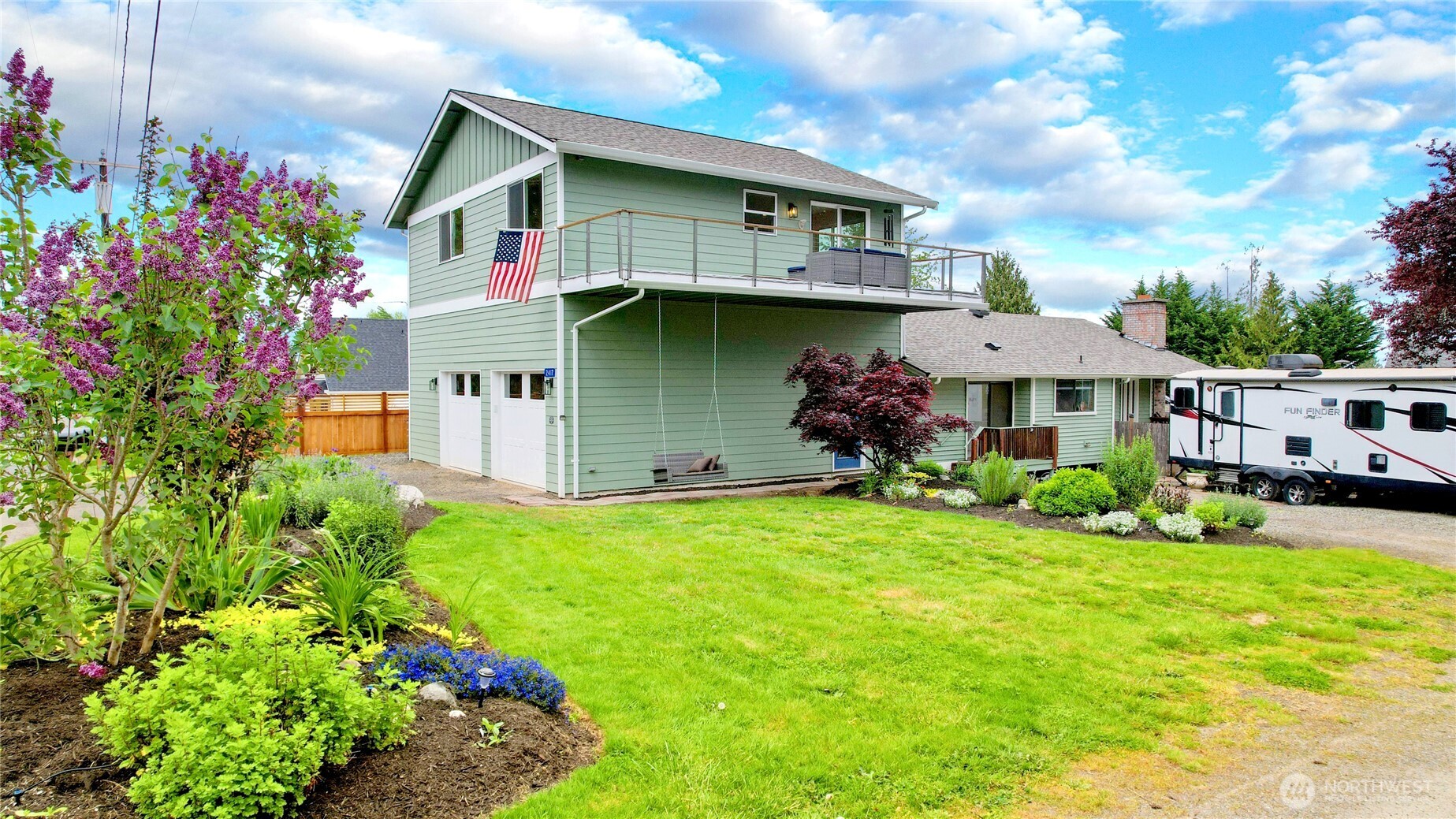 2417 Cedar Street East Port Orchard, WA 98366 - Photo 4 of 40 a front view of house with yard and trees around