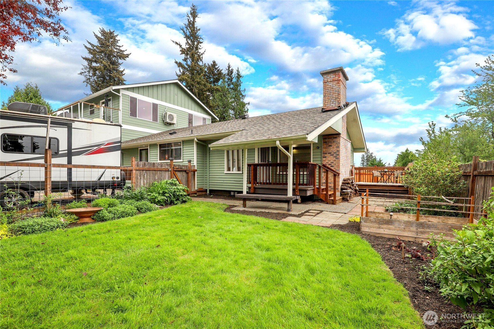 2417 Cedar Street East Port Orchard, WA 98366 - Photo 6 of 40 a view of a house with a yard and sitting area