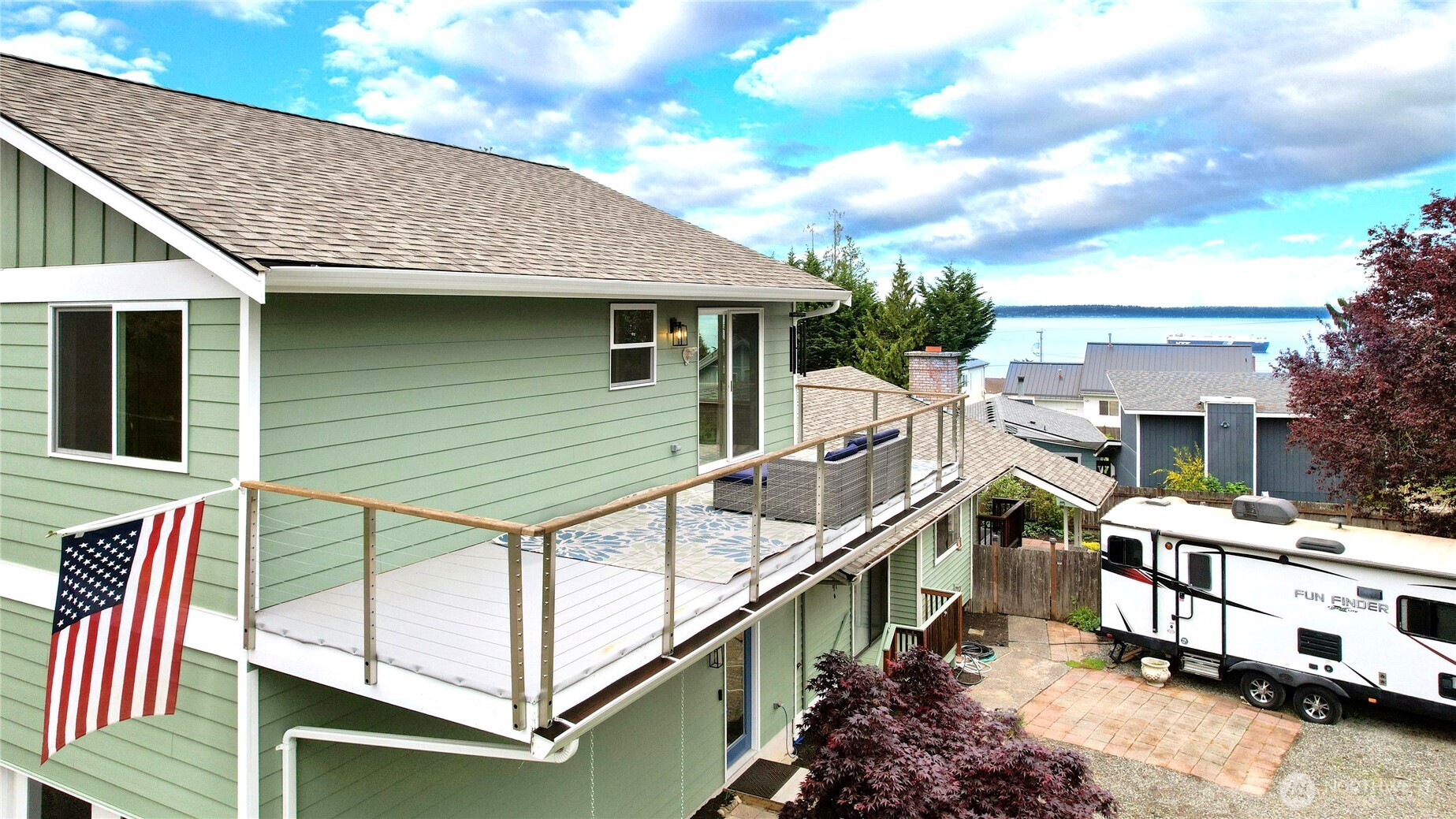 2417 Cedar Street East Port Orchard, WA 98366 - Photo 7 of 40 a view of house with roof deck and furniture