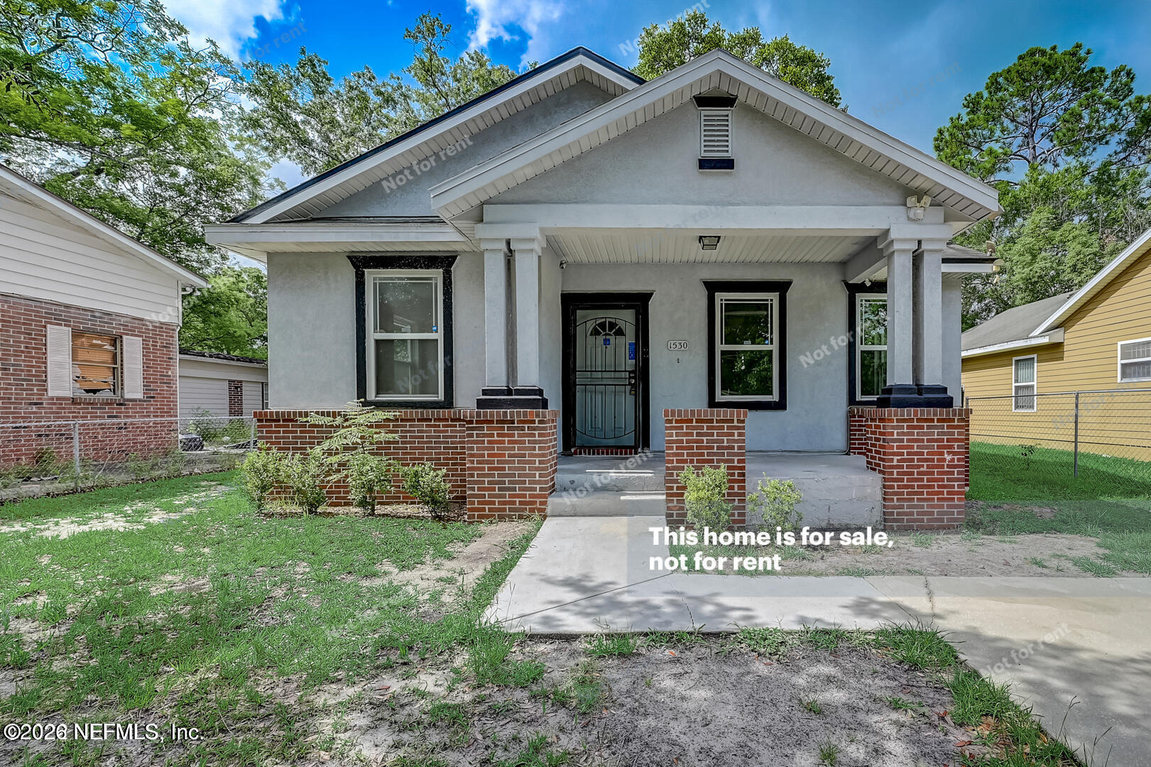 1530 West 29th Street Jacksonville, FL 32209 - Photo 1 of 12 a front view of a house with garden