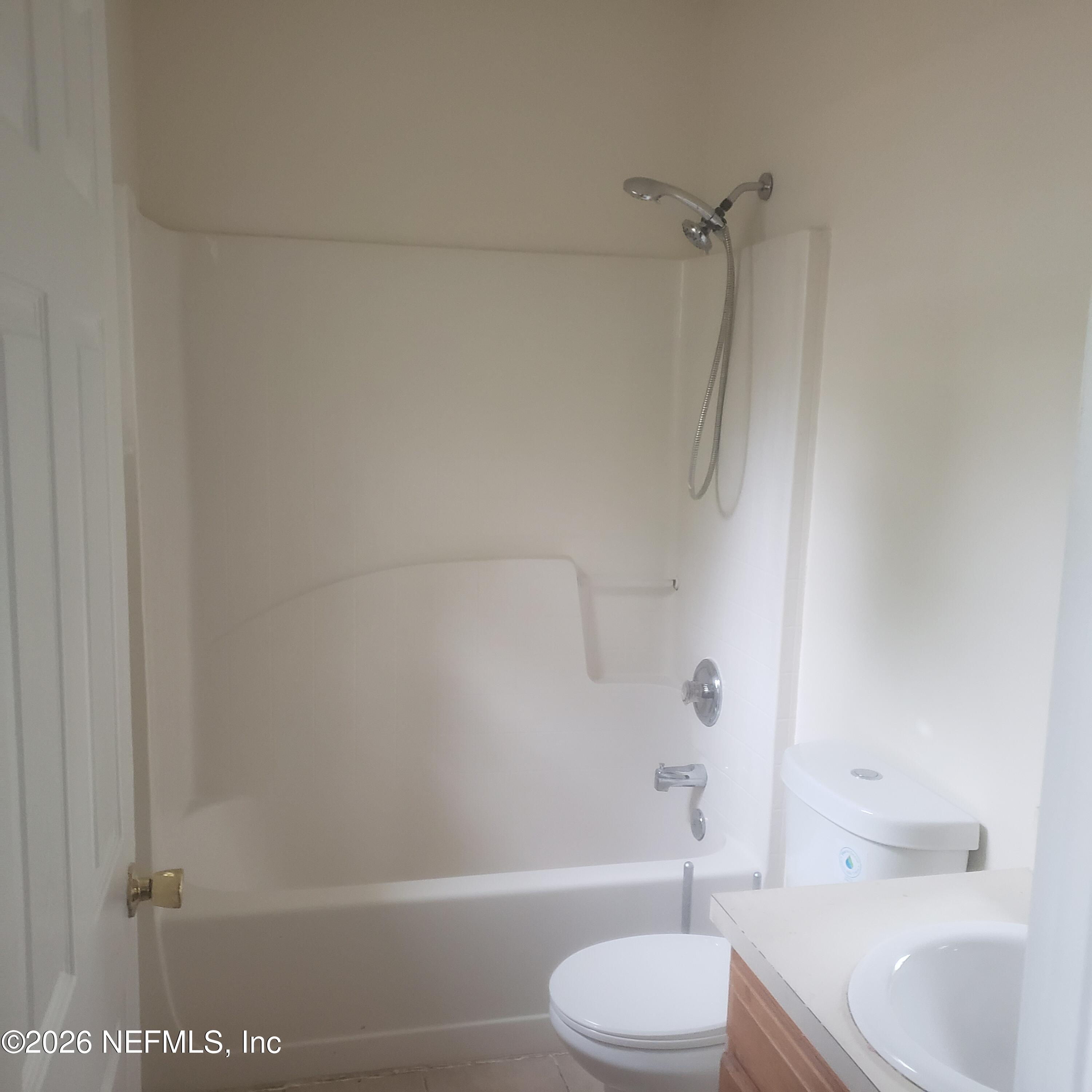 1530 West 29th Street Jacksonville, FL 32209 - Photo 12 of 12 a bathroom with a toilet and shower
