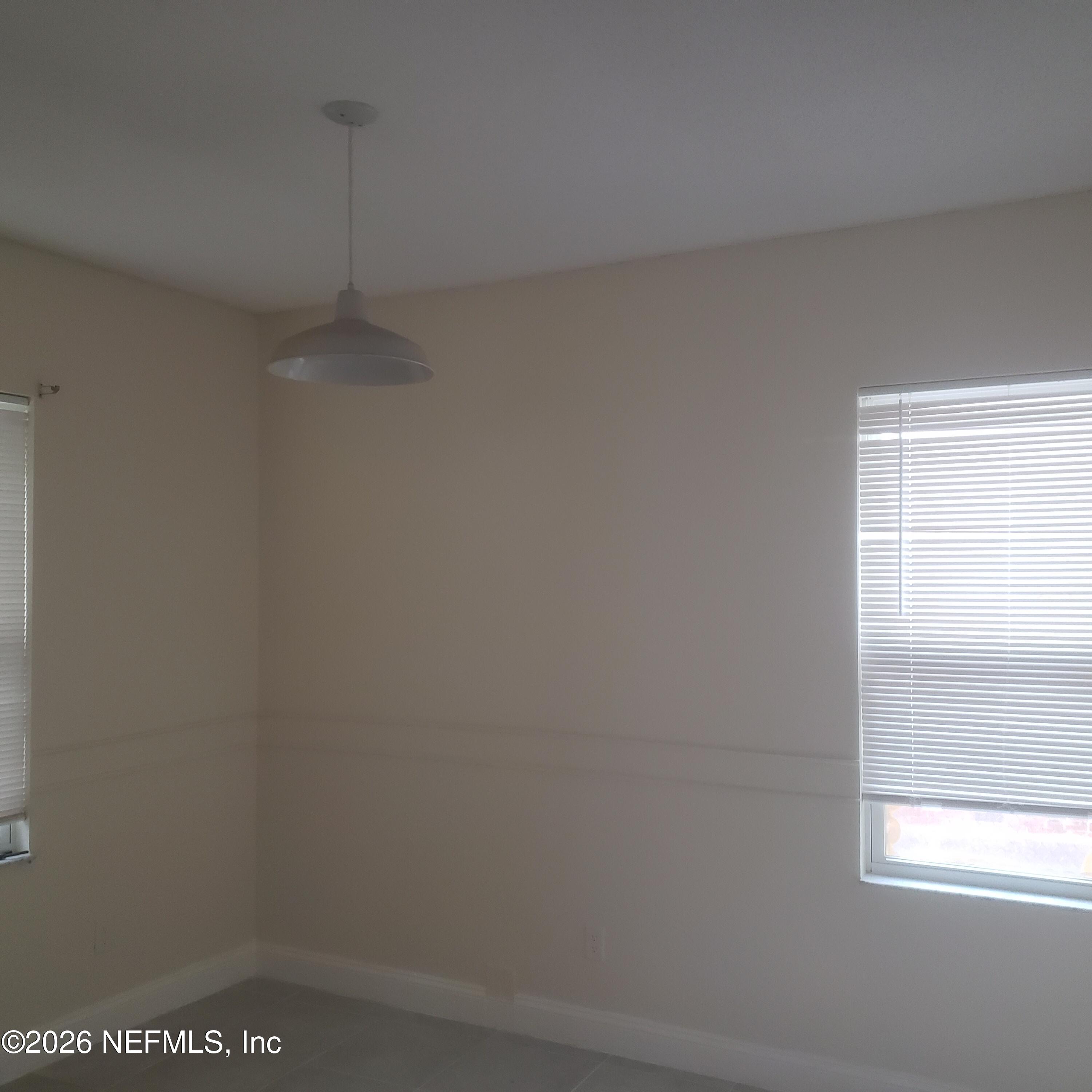 1530 West 29th Street Jacksonville, FL 32209 - Photo 7 of 12 a bathroom with a window