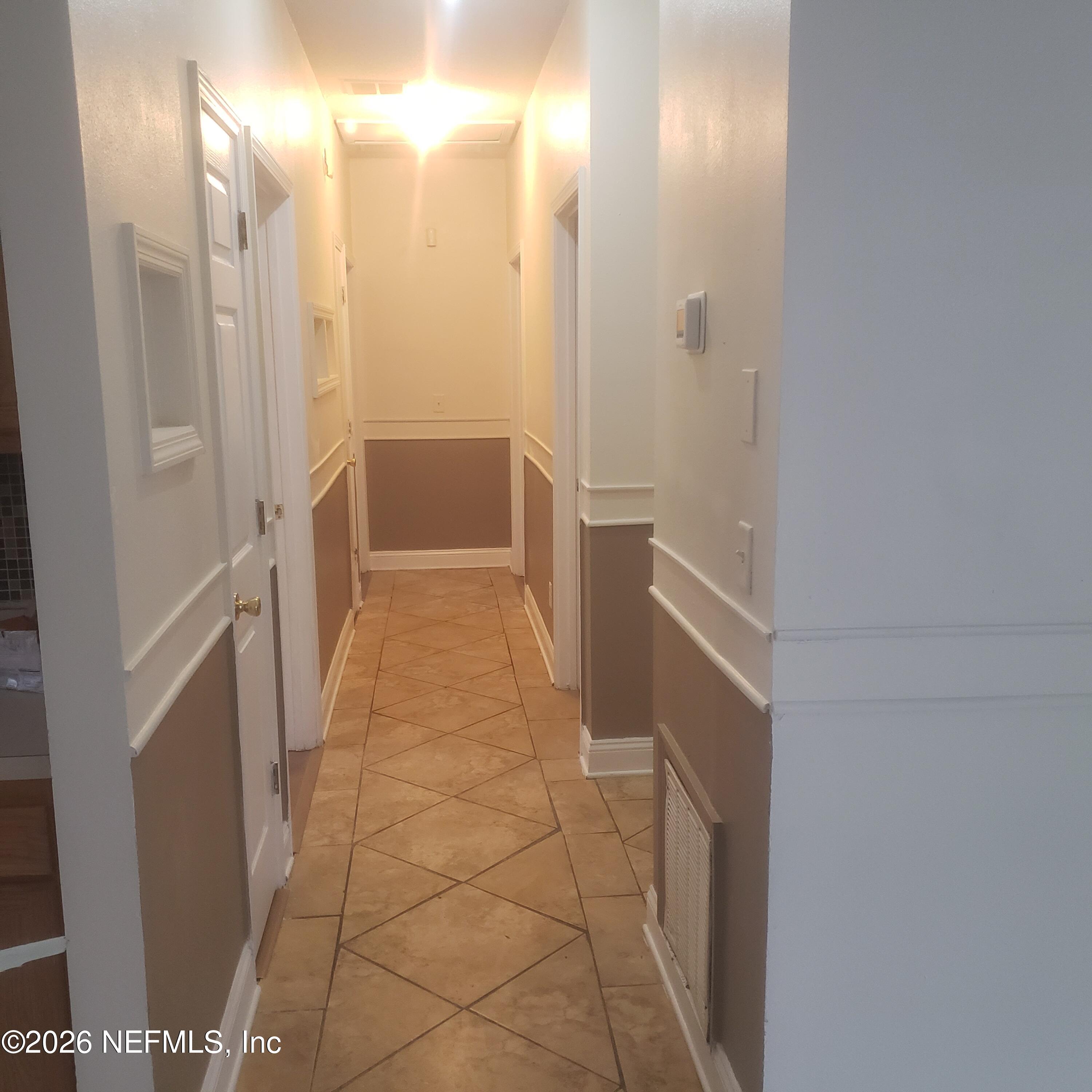 1530 West 29th Street Jacksonville, FL 32209 - Photo 8 of 12 a bathroom with a glass door shower