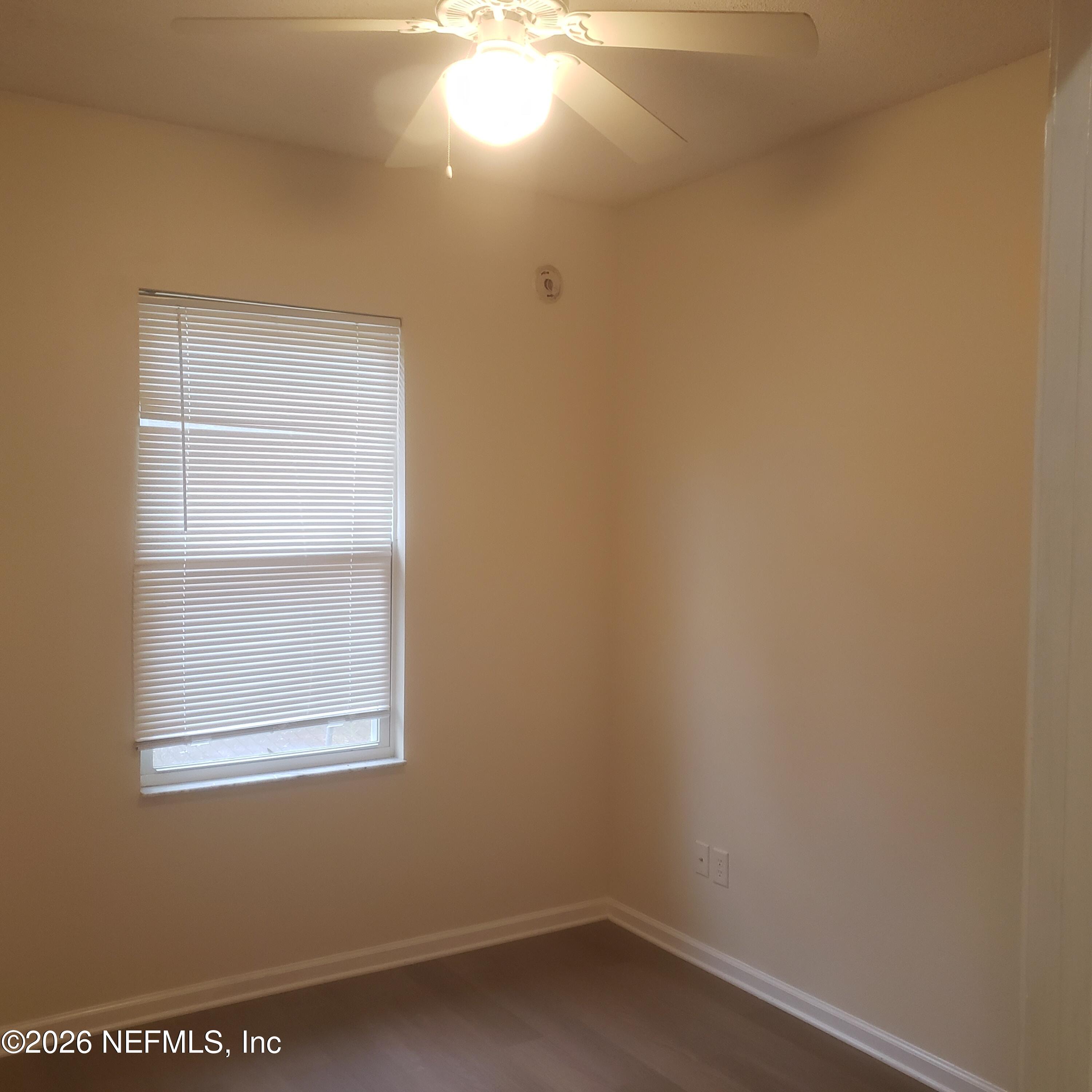 1530 West 29th Street Jacksonville, FL 32209 - Photo 9 of 12 a view of an empty room with a window