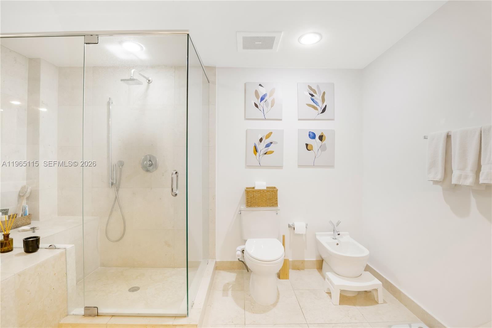 495 Brickell Avenue, Unit 4704 Miami, FL 33131 - Photo 16 of 24 a bathroom with a shower toilet and sink