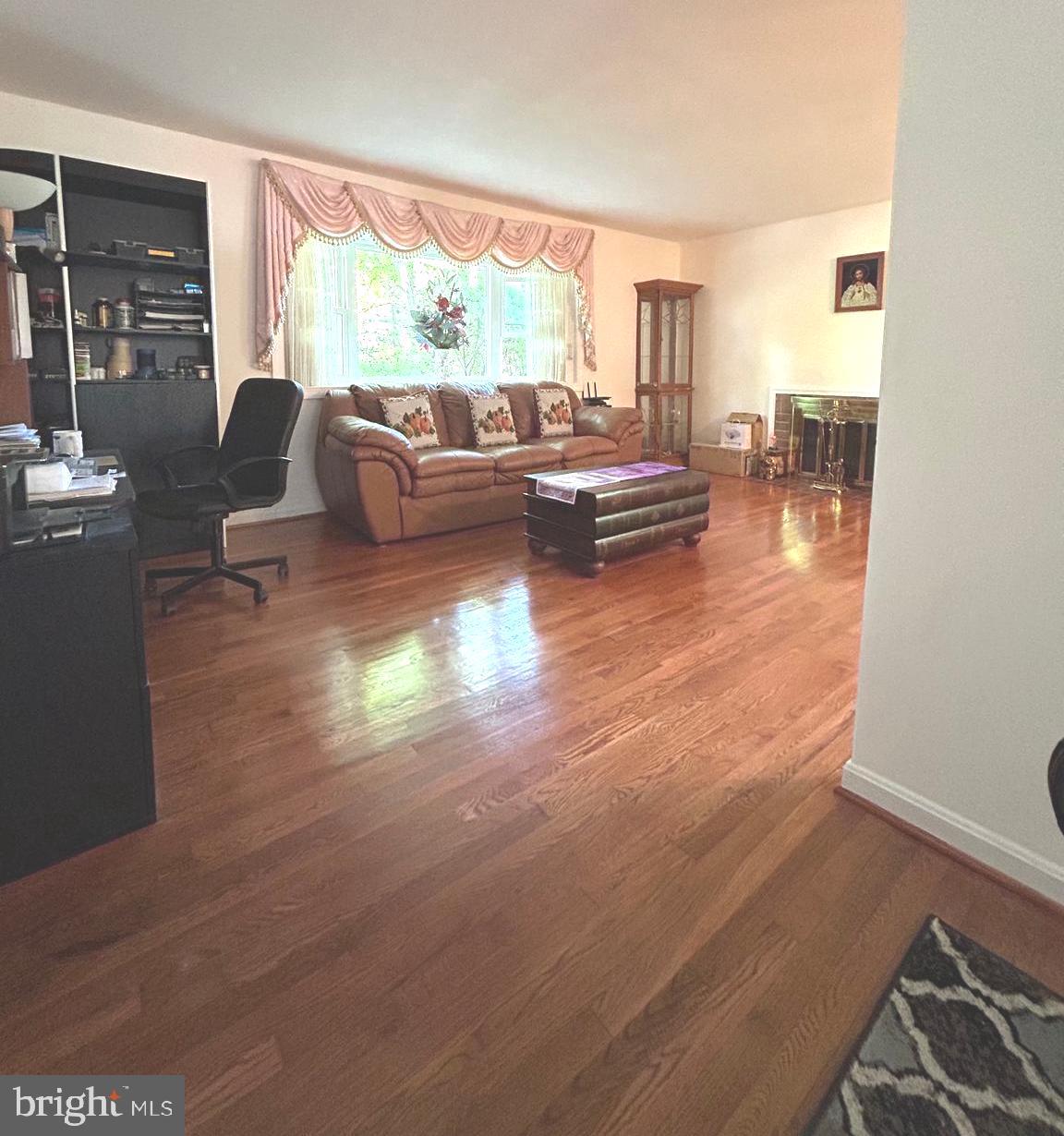5606 Ventnor Lane Springfield, VA 22151 - Photo 4 of 24 a living room with furniture and a large window
