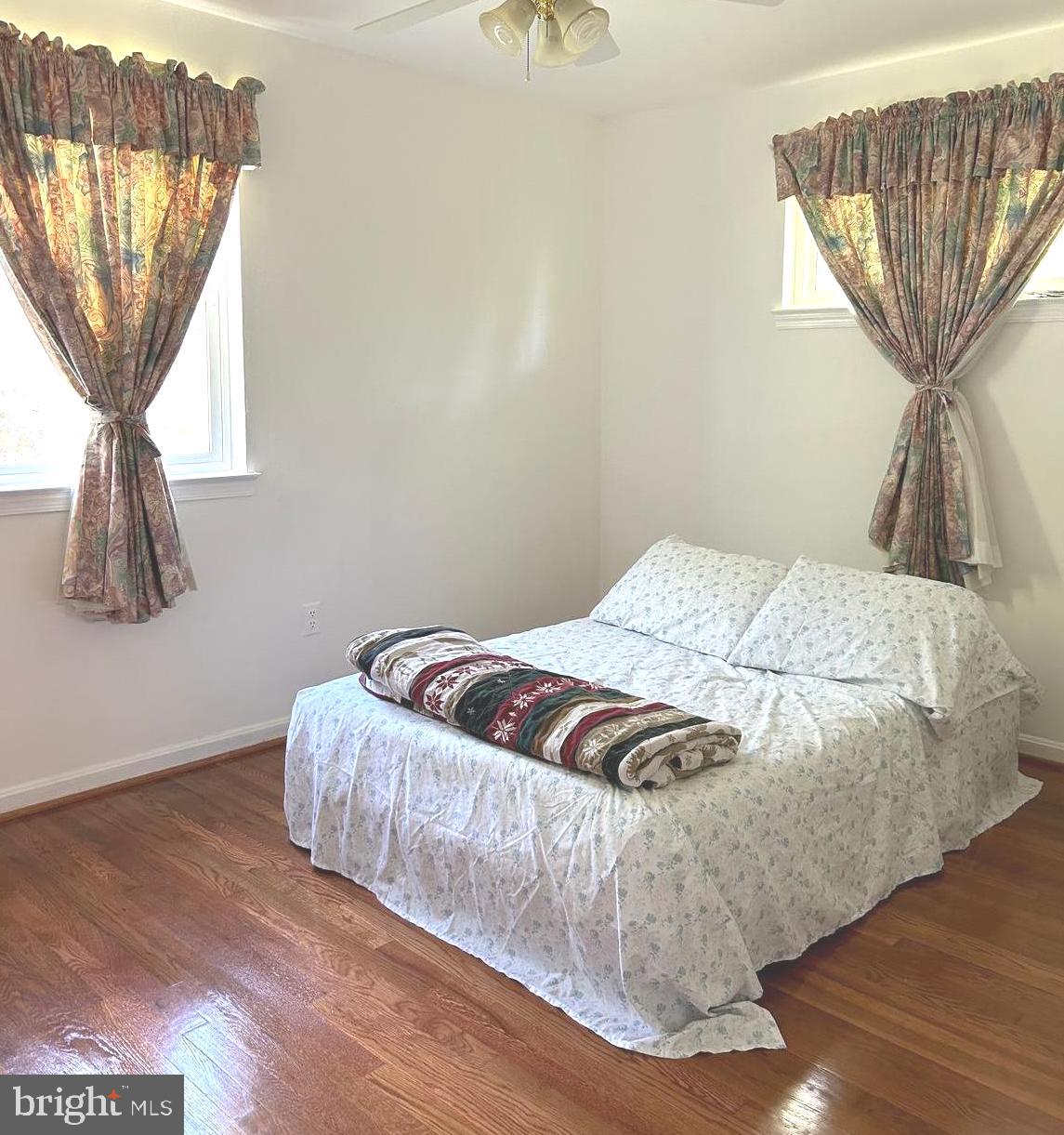 5606 Ventnor Lane Springfield, VA 22151 - Photo 10 of 24 a bedroom with a bed and a window