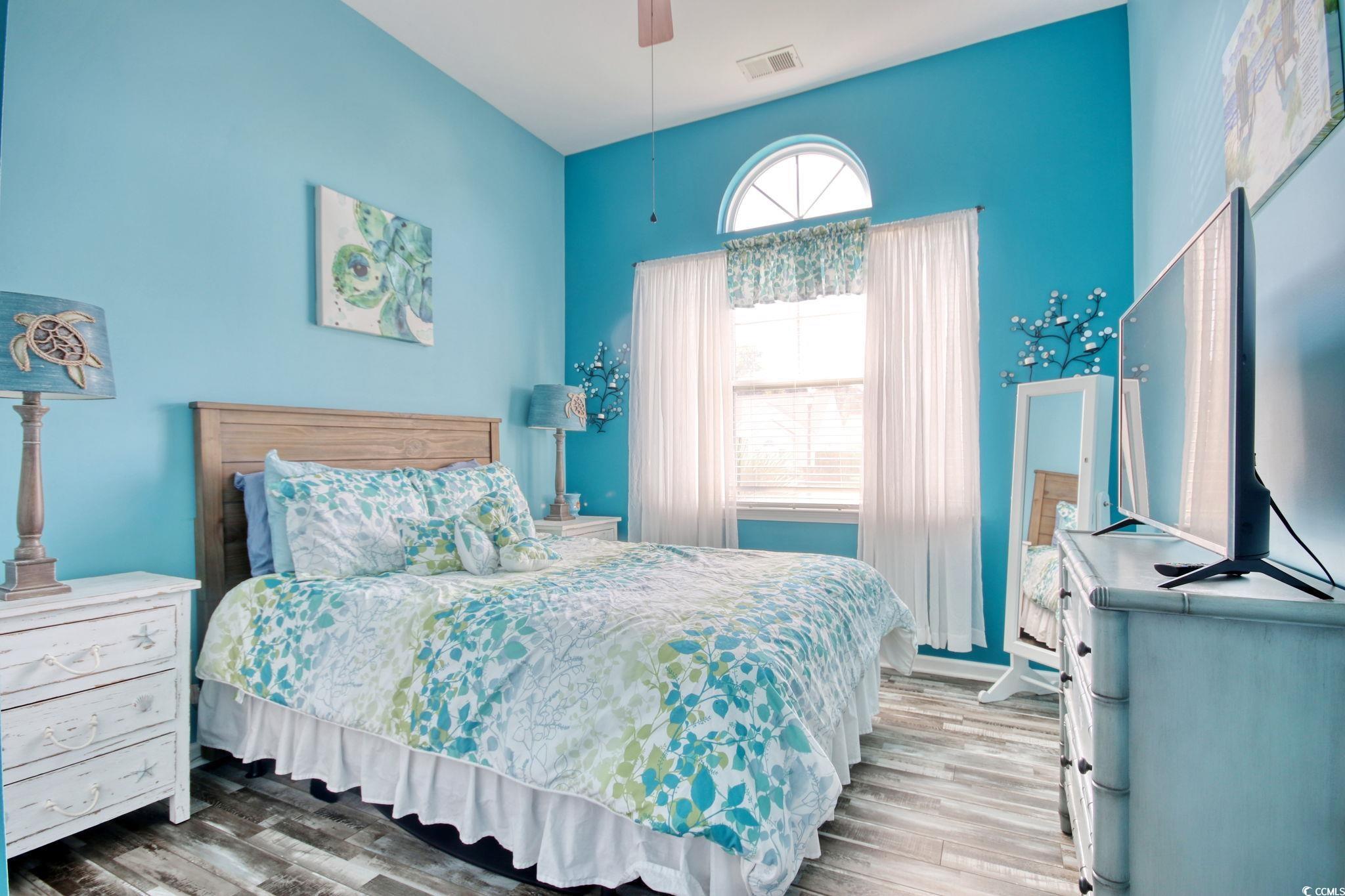 47 Pinfeather Drive Murrells Inlet, SC 29576 - Photo 15 of 35 Bedroom with wood finished floors and a ceiling fan