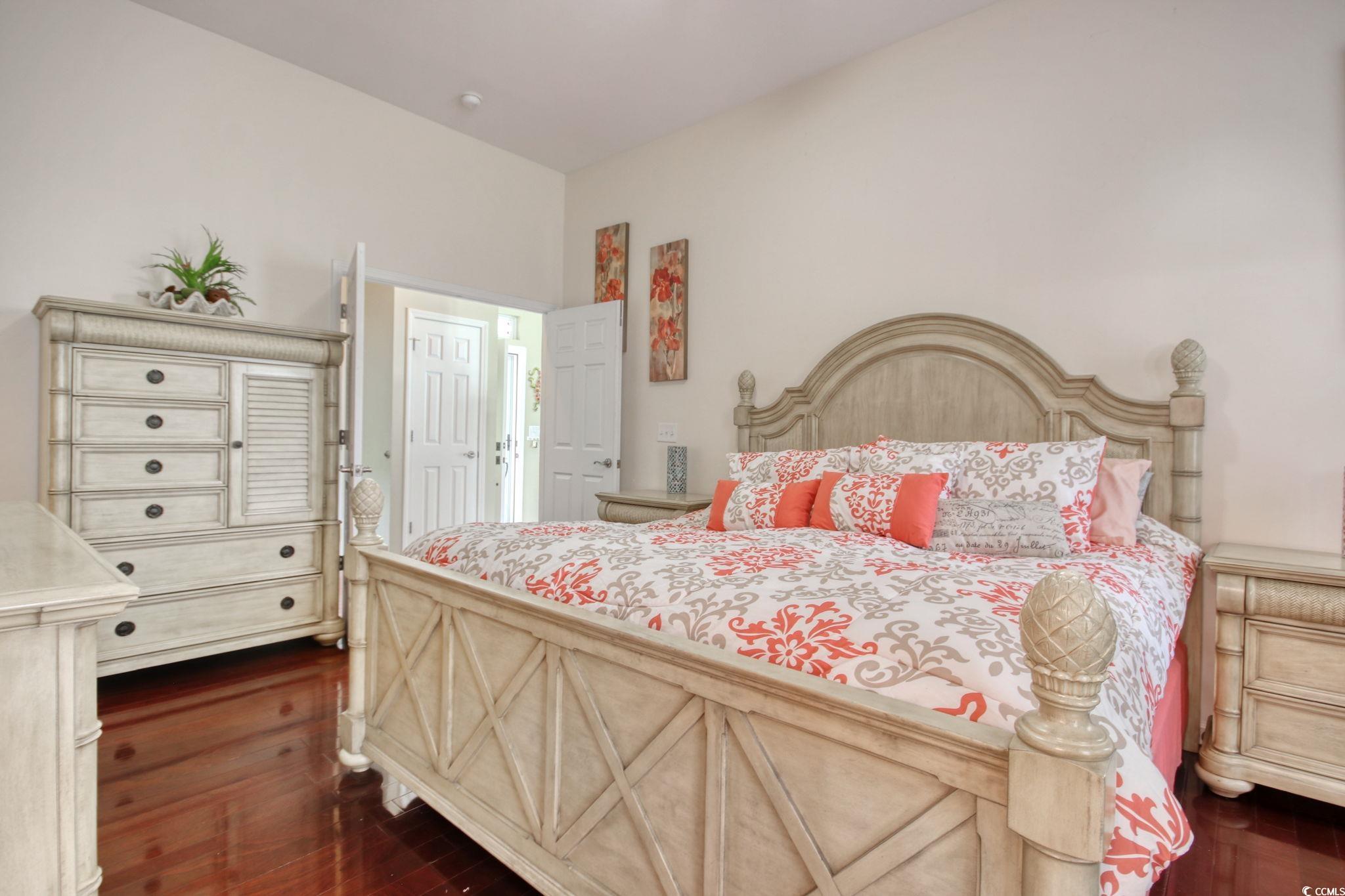 47 Pinfeather Drive Murrells Inlet, SC 29576 - Photo 20 of 35 Bedroom featuring dark wood-type flooring