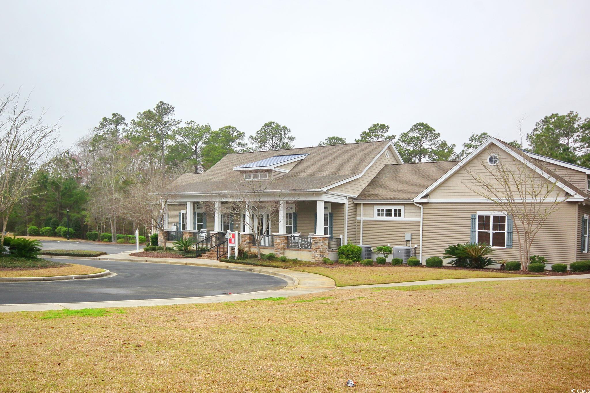 47 Pinfeather Drive Murrells Inlet, SC 29576 - Photo 27 of 35 Craftsman-style house featuring a porch and a front yard