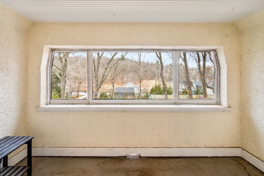 12 Leighton Road Wellesley, MA 02482 - Photo 21 of 34 a view of a livingroom with wooden floor and a large window