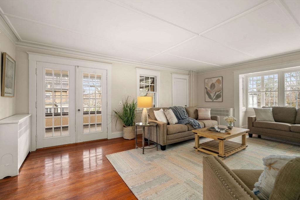 12 Leighton Road Wellesley, MA 02482 - Photo 5 of 34 a living room with furniture and a large window